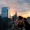 people on a balcony over looking the city