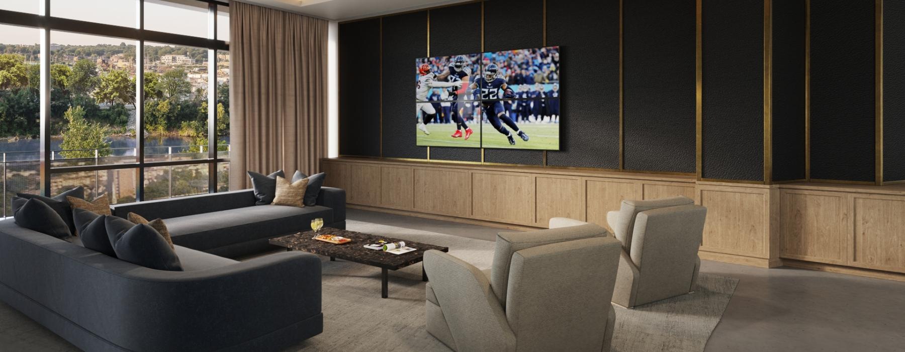 a living room with a large screen