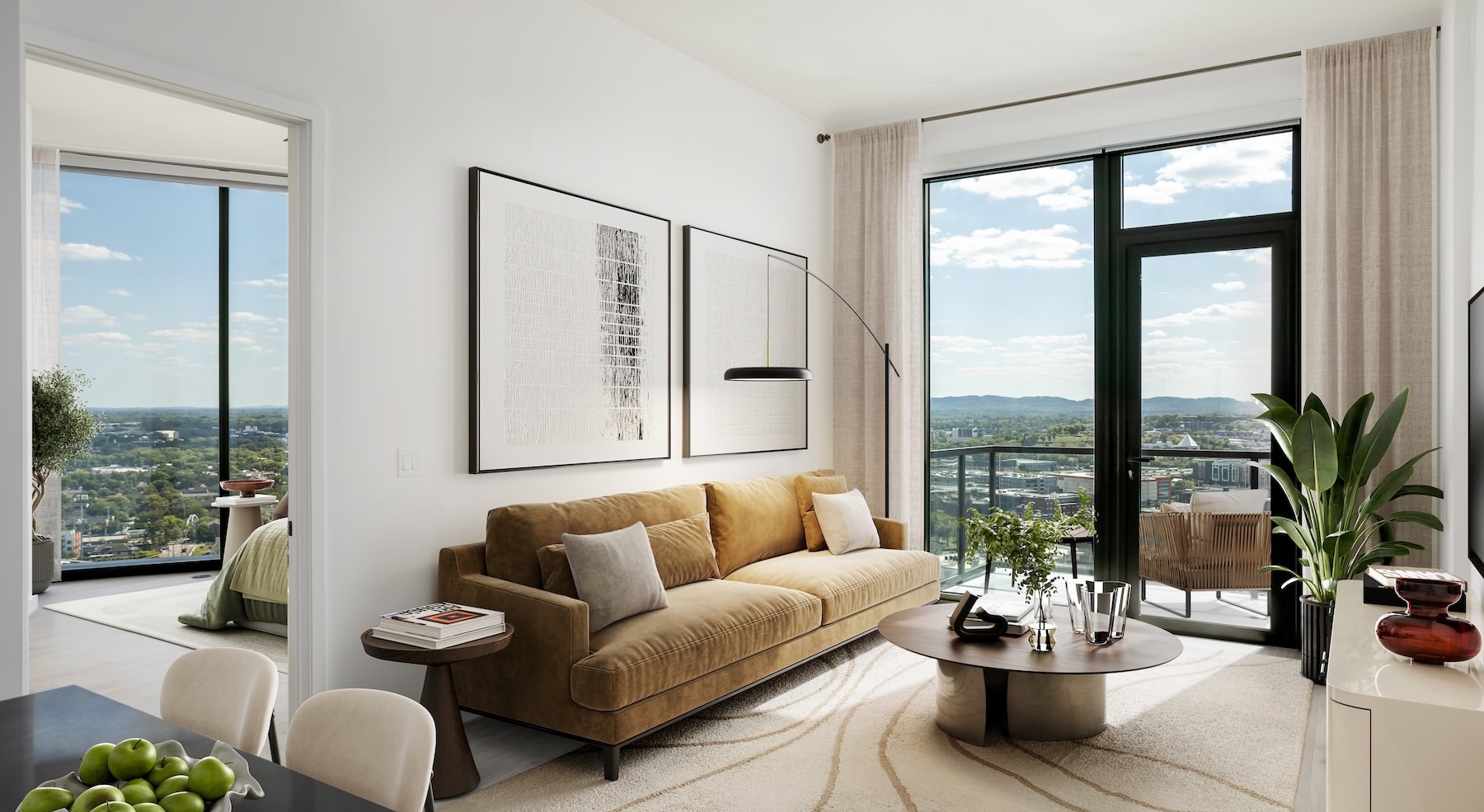 living room with couch coffee table and large windows