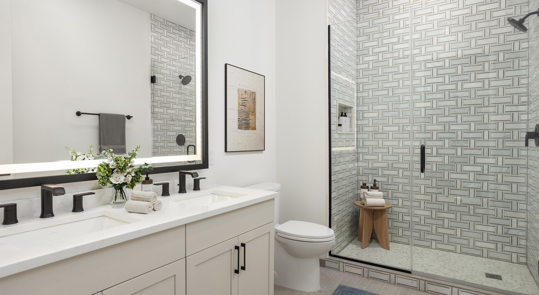 bathroom with large mirror shower and toilet
