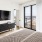 Bedroom with natural lighting and high ceilings