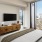 Bedroom with natural lighting and high ceilings